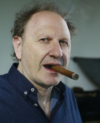 Douglas Wolfsperger mit Zigarre